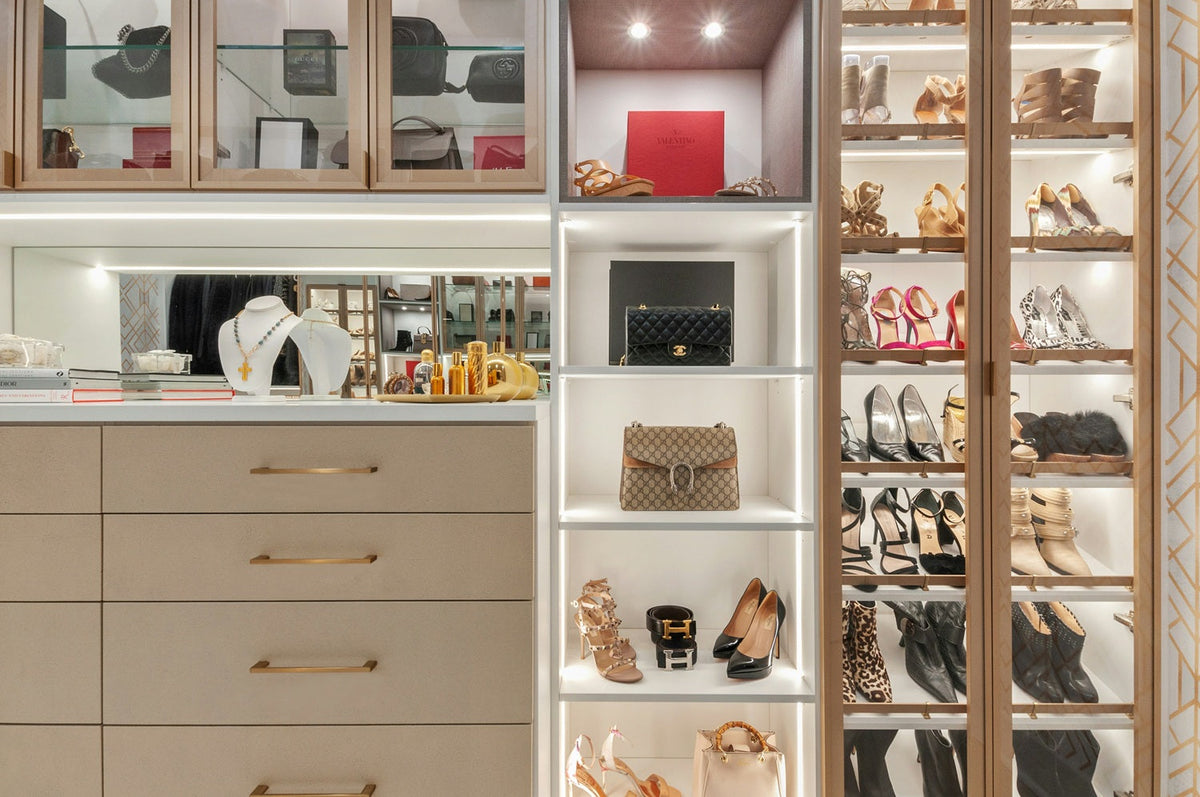 a closet full of luxury designer pieces
