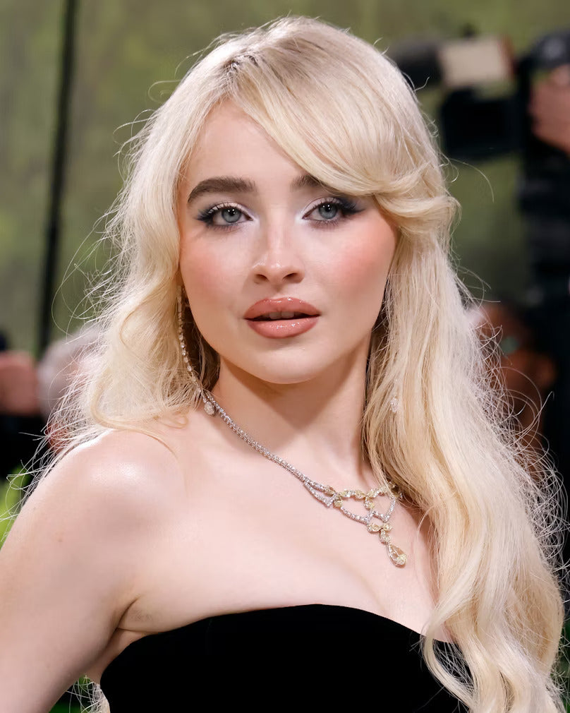 Sabrina Carpenter at the MET Gala 2024 wearing  Bucherer Fine Jewelry