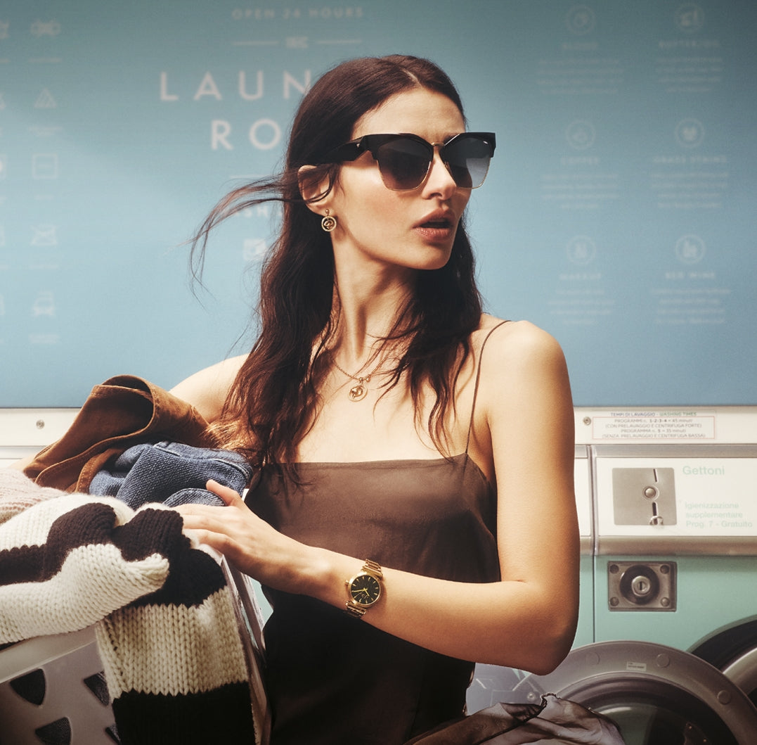 Model wearing a watch from the brand Police