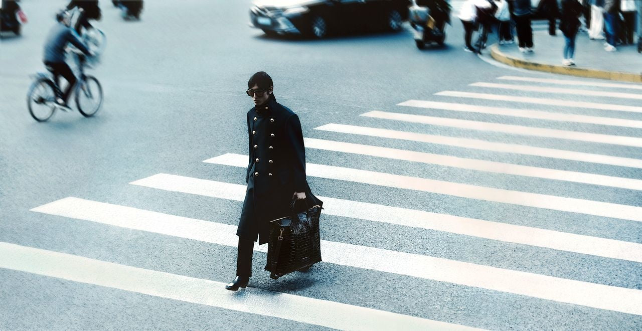 A model walking the crosswalk for Tom Ford campaign