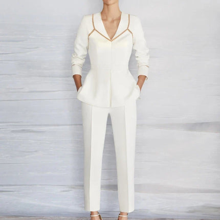A woman wearing a pantsuit, also known as a bridal pantsuit at Ellie Belle