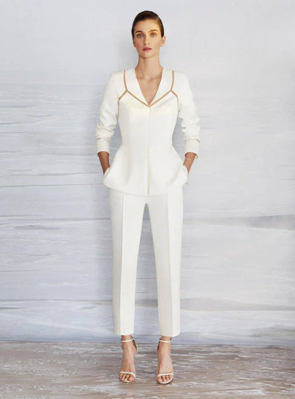 A woman wearing a pantsuit, also known as a bridal pantsuit at Ellie Belle