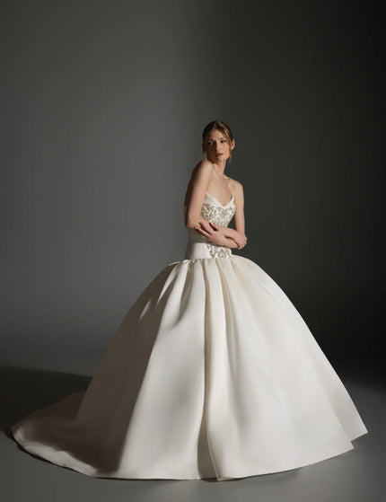 Bride wearing a Lazaro Maison Perez wedding gown at Ellie Belle