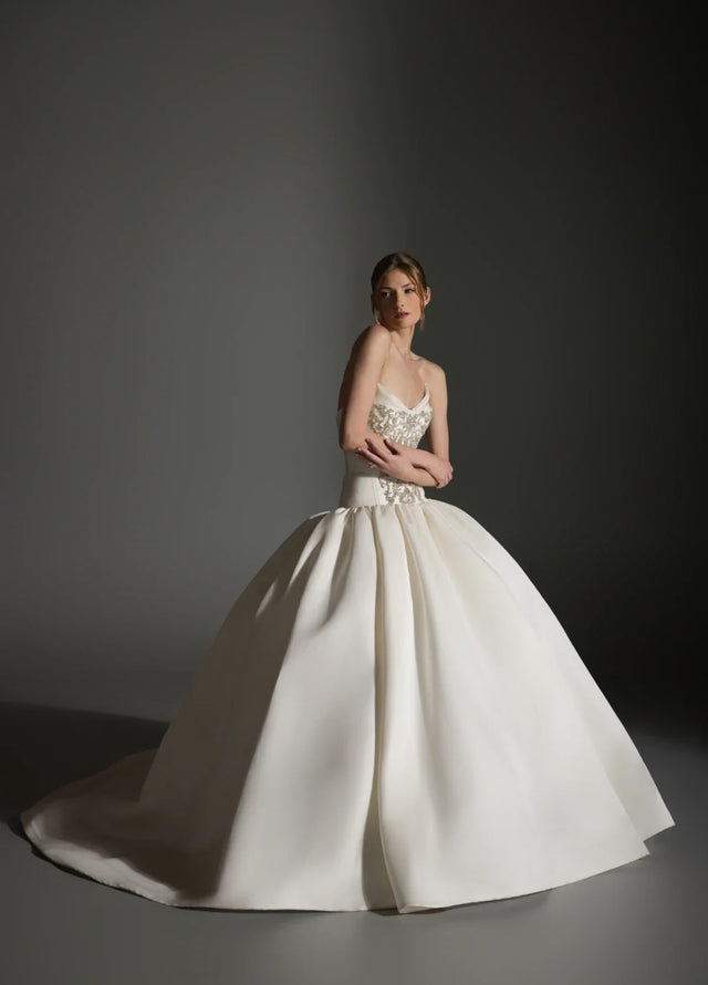 Bride wearing a Lazaro Maison Perez wedding gown at Ellie Belle