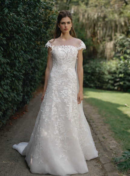 Anne Barge Cromwell Wedding Dress on a model at Ellie Belle