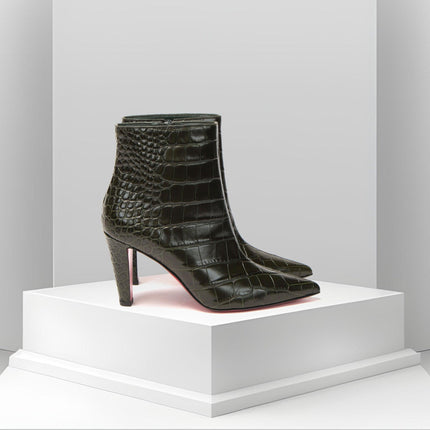 christian louboutin black boots at Ellie Belle