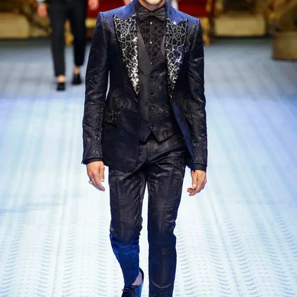 A man walking in Dolce & Gabbana tuxedo