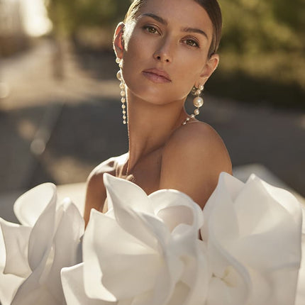 Bridal Earrings at Ellie Belle - a brode wearing one of Ellie Belle's bridal earrings