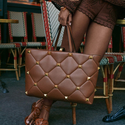 Women’s designer new arrivals at Ellie Belle featuring luxury dresses and eveningwear.