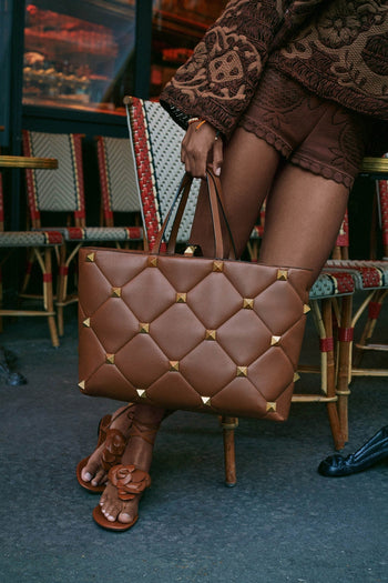 Women’s designer new arrivals at Ellie Belle featuring luxury dresses and eveningwear.