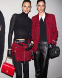Two female models featuring the Versace designer clothing and handbags at Ellie Belle in Eden Prairie, Minnesota