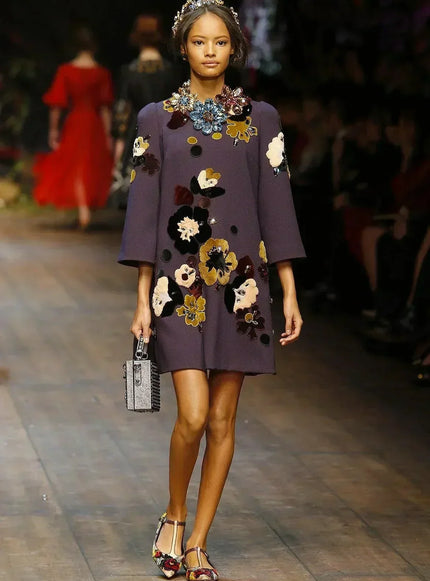 Model walking down a runway - Ellie Belle