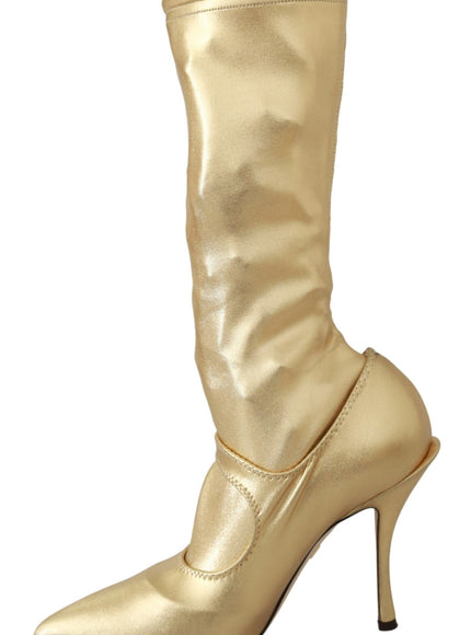 a pair of gold high heeled shoes