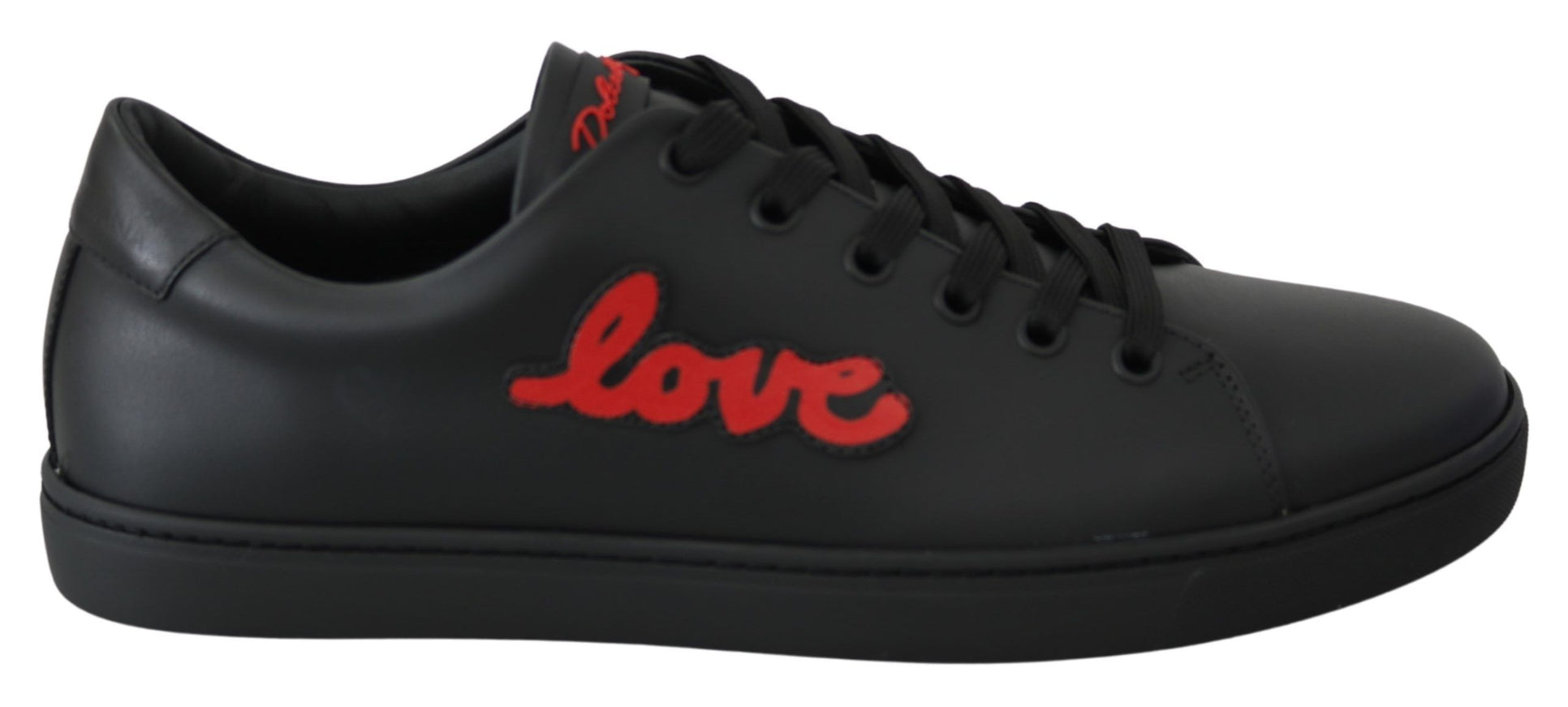 a pair of black and red sneakers with the word love on it