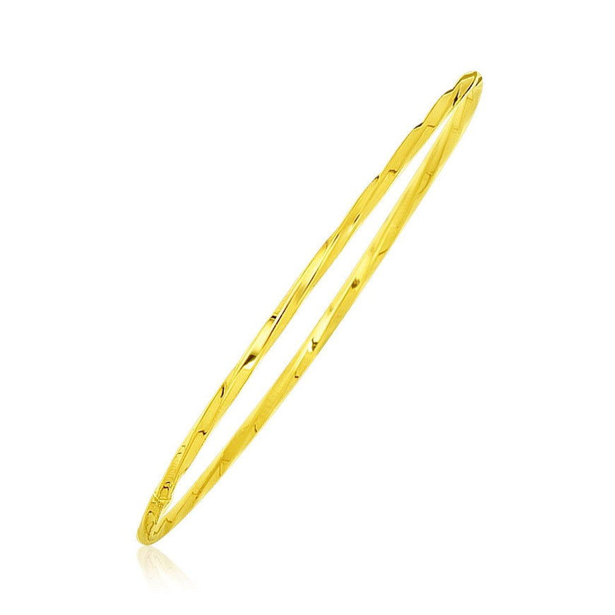 14k Yellow Gold Thin Twisted Shiny Bangle - Ellie Belle