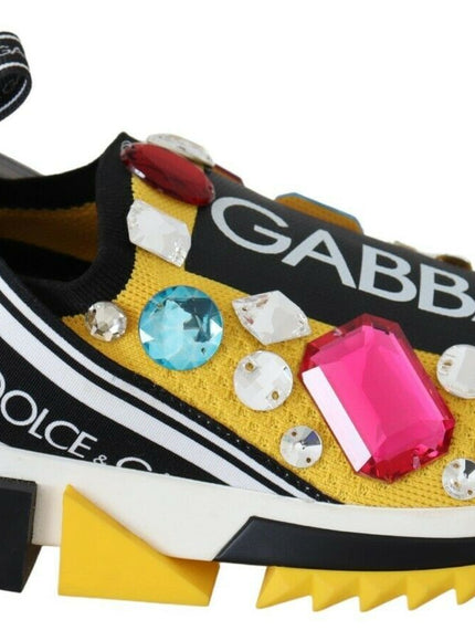 a pair of shoes with colorful stones on them