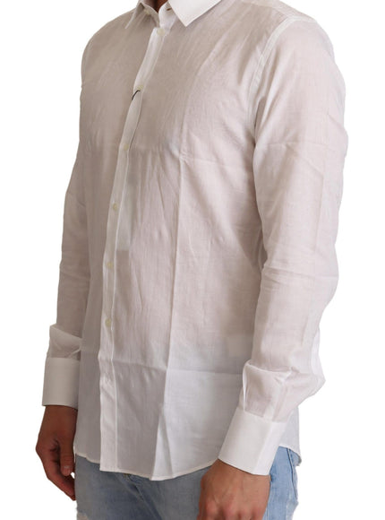 a man wearing a white shirt and jeans