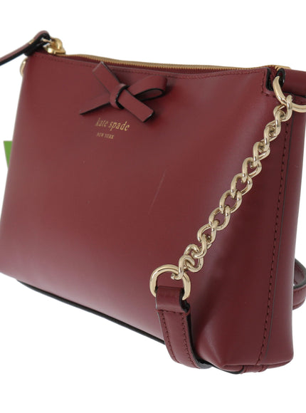 Kate Spade Bordeaux crossbody side view with chain strap