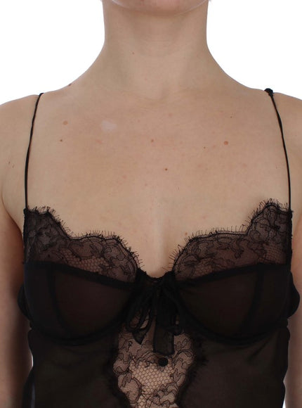 a woman wearing a black bra with a sheer top