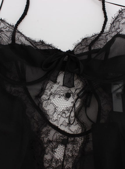 a woman's black top with lace on it