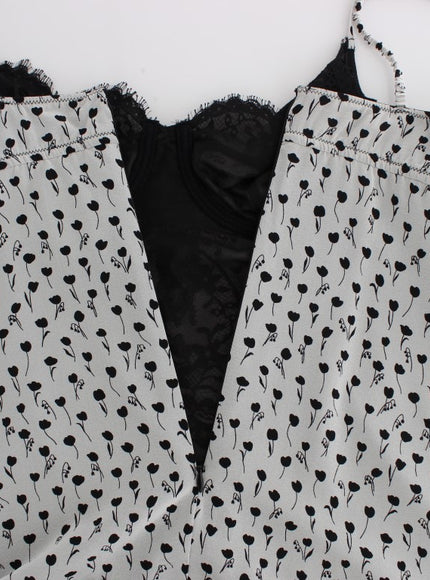 a white and black top with black spots on it