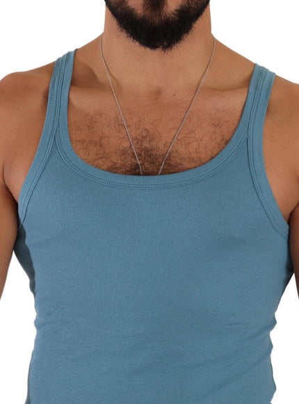 a man with a beard wearing a blue tank top