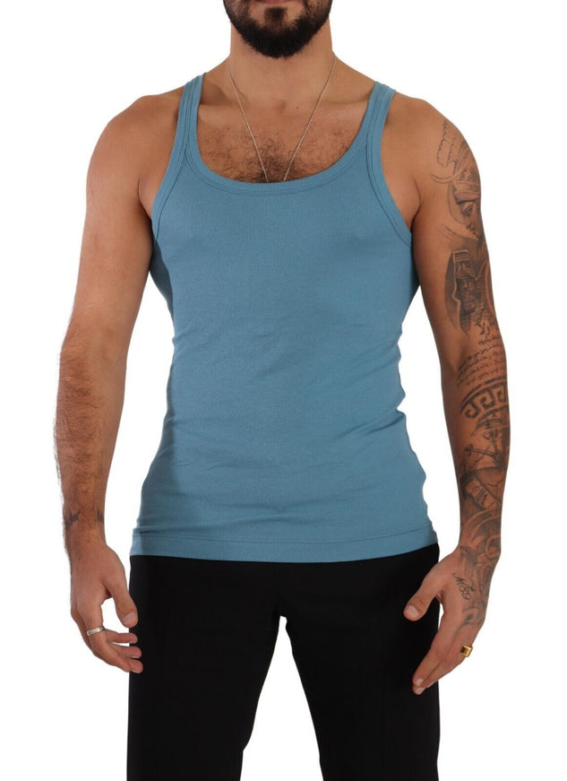 a man with a beard wearing a blue tank top