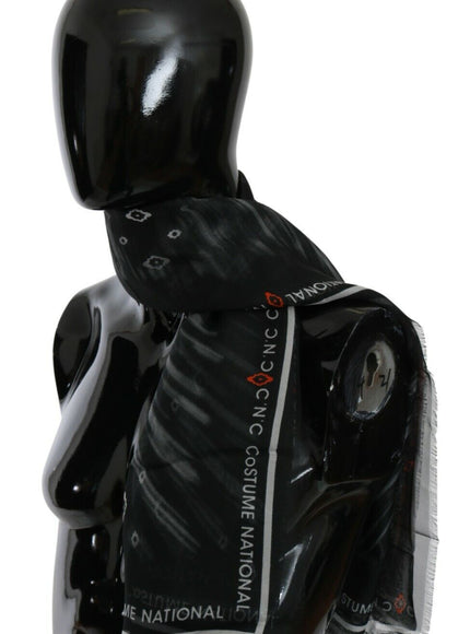 a black mannequin with a white and red label on it