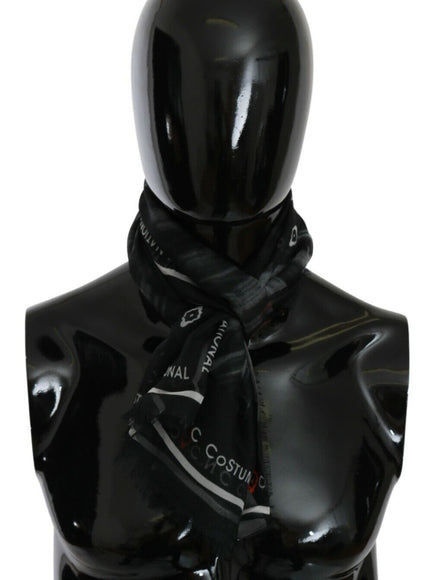 a black mannequin with a scarf around its neck