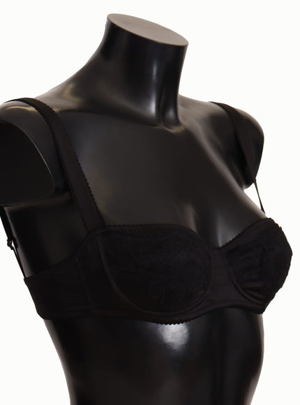 a female mannequin wearing a black bra