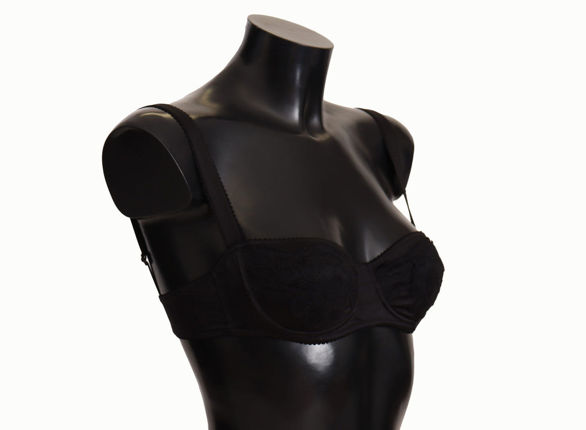 a female mannequin wearing a black bra