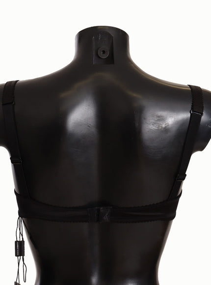 a black mannequin with a harness on it's back