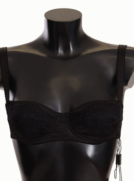 a female mannequin wearing a black bra