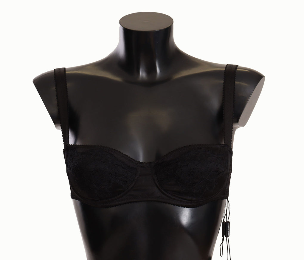 a female mannequin wearing a black bra