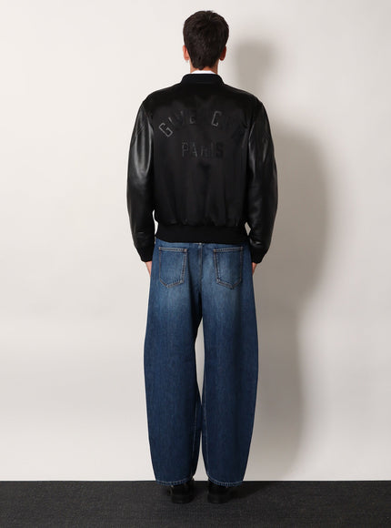 Givenchy Twisted Stone-Washed Denim Jeans