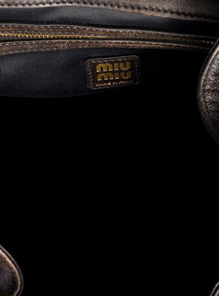 Miu Miu Leather Backpack With A Vintage Effect