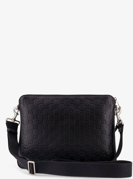 Gucci Leather Gg Emblem Crossbody Bag With Embossed Gg Motif