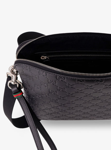 Gucci Leather Gg Emblem Crossbody Bag With Embossed Gg Motif