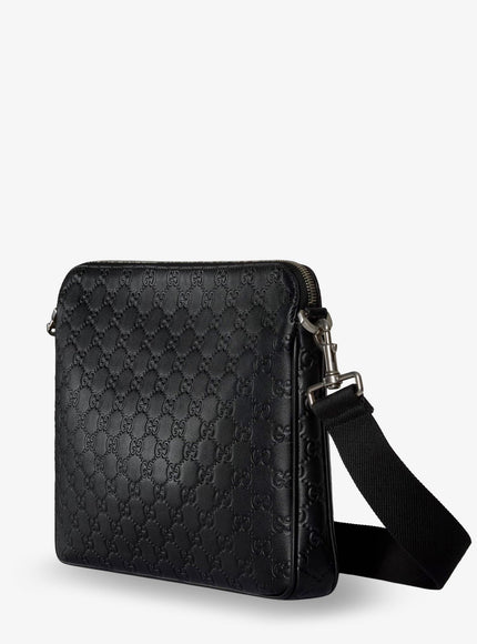 Gucci Leather Gg Emblem Crossbody Bag With Embossed Gg Motif