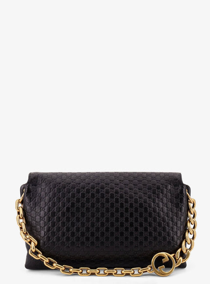 Gucci Leather Crossbody Bag With Embossed Gg Motif