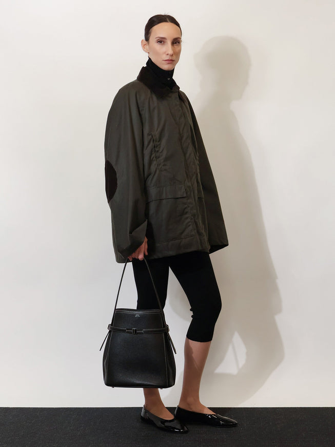 Toteme Hammered Leather Bucket Bag With Strap On The Front