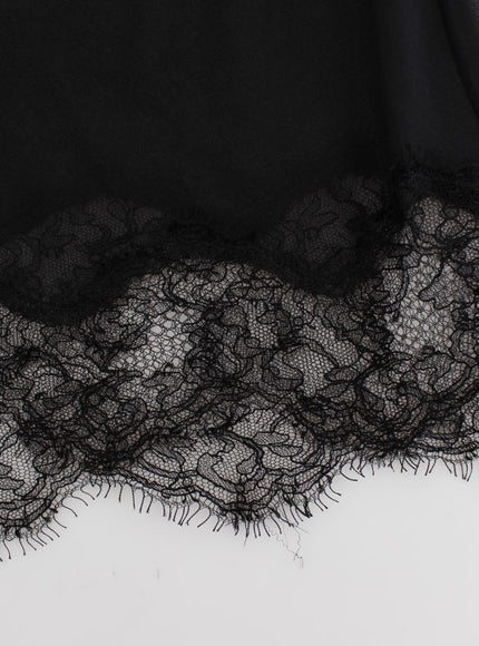 a black dress with lace on the bottom of it