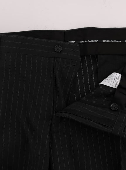 a close up of a black suit pants