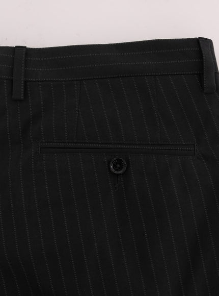 a close up of a suit pants on a white surface