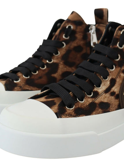 a pair of leopard print high top sneakers