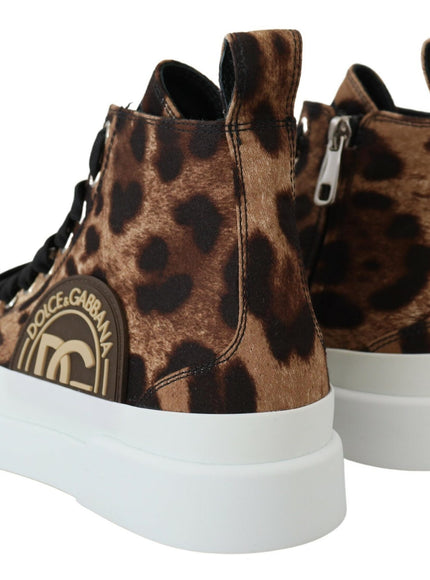 a pair of leopard print high top sneakers