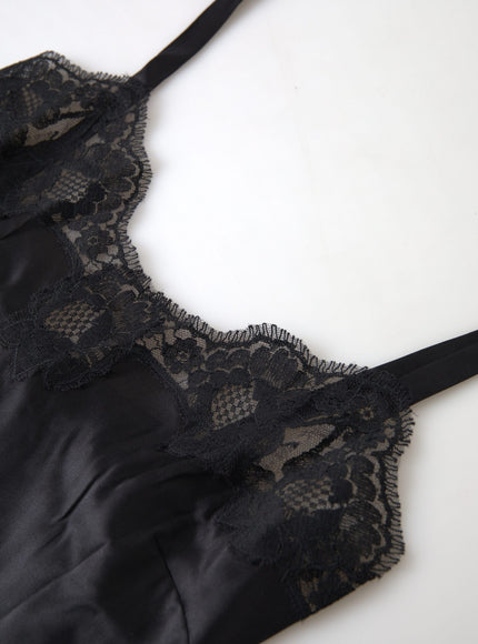 a black lingerie with a black tie on a white surface