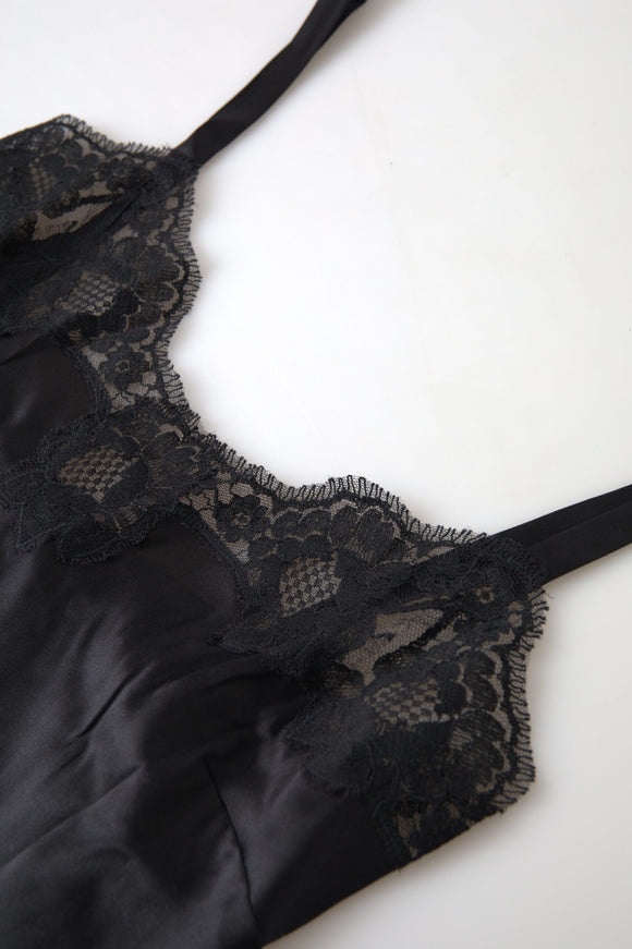 a black lingerie with a black tie on a white surface