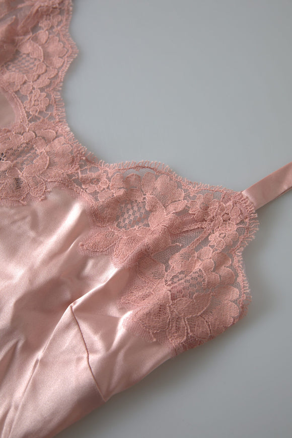 a piece of pink lingerie laying on top of a table