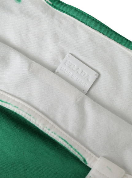 a close up of a green and white bag